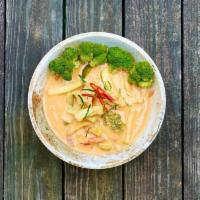 Panang Curry · Popular Thai peanut curry with coconut milk, basil and kaffir-limes leaves