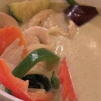 Green Curry · Simmered in green curry paste in coconut milk with bamboo shoots, bell peppers eggplant, bas...