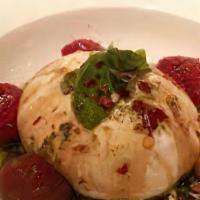 Burratta Plate · W tomatoes and drizzled with balsamic