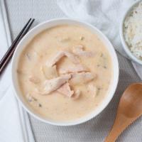 Tom Kha (Coconut Soup) · Classic Thai coconut soup with your choice of meat, galangal, cabbage, mushrooms, lemon gras...