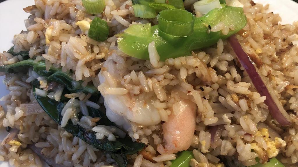 Salted Fish Fried Rice · Fried rice with salted fish, Chinese broccoli, and red onion.