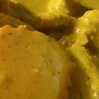 Yellow Curry · Your choice of meat with potatoes, carrot, onion, and coconut milk in yellow curry.