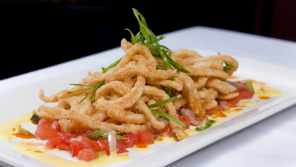 Calamari Fryes · Tempura battered with mild spices and fried.