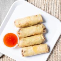 Crispy Spring Rolls · Golden fried egg rolls with crystal noodles, carrot, cabbage and celery served with sweet ch...