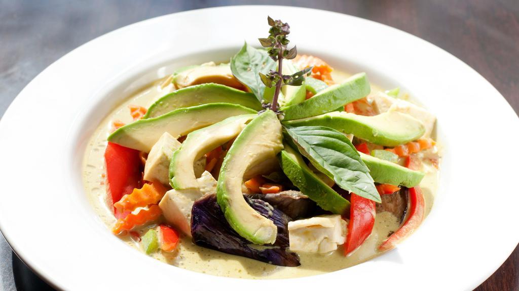 Avocado Curry · Homemade green curry with a delicious Californian grown avocado with bell peppers, basil leaves, carrot and eggplant.