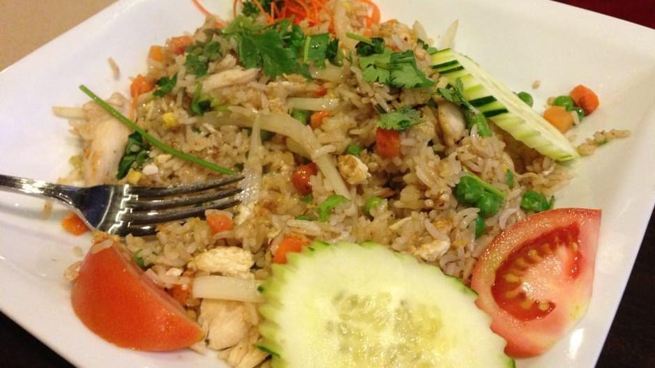 Thai Fried Rice · Egg, onion, pea, carrot, cucumber and tomato.