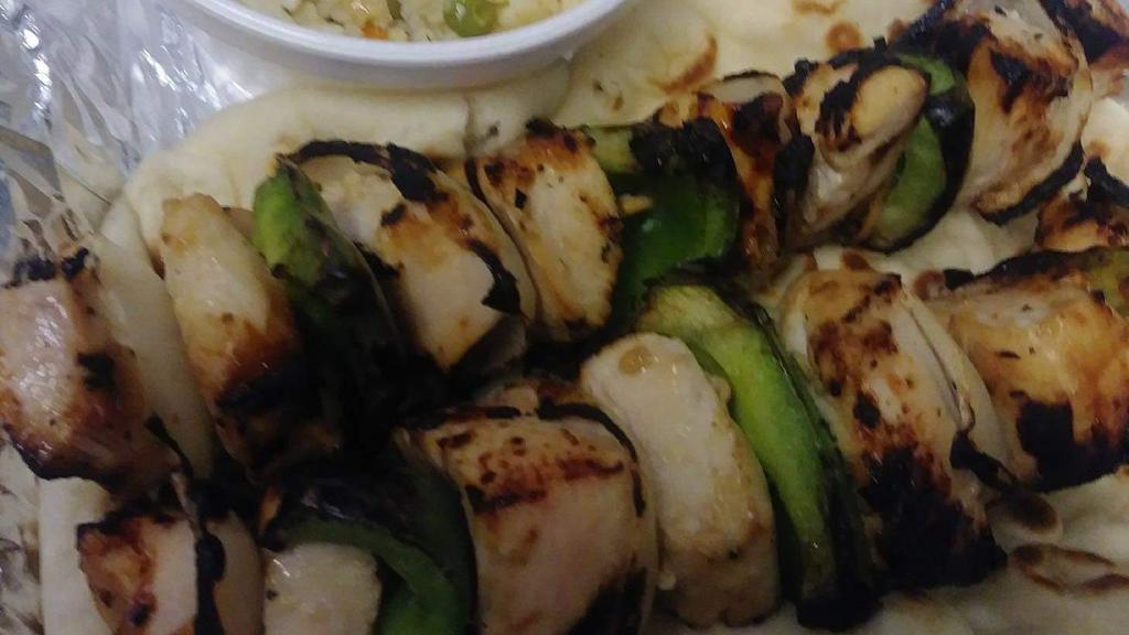 Chicken Shishkabob Dinner · 2 kabobs, 2 pitas and your choice between french fries, rice, or mac n cheese.