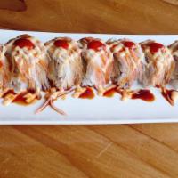 Temptation Roll · Shrimp tempura, cucumber, cream cheese top with Kanikama, Spicy mayo, Eel sauce and Sriracha