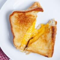 Super Grilled Cheese Sandwich · Three slices of texas toast and four slices of american cheese, drizzled with honey.