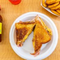 The Fatboy · Three slices of Texas toast and four slices of cheese with your choice of premium protein.