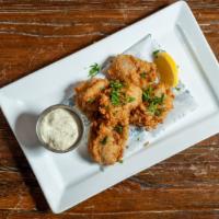 Fried Oysters · Dusted and fried, tartar sauce, lemon.