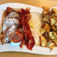 The Hungry Man Platter · Two slices of french toast, two any-style eggs, choice of bacon, sausage, turkey, or ham and...