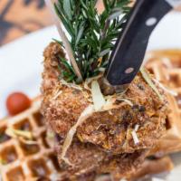 The Big O Sage Fried Chicken & Waffle Tower · Two sage fried chicken breasts, smoked bacon waffle, hot maple reduction, fried leeks and se...