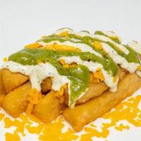 Loaded Yucca Fries · Vegetarian. Loaded yucca fries with Cheddar cheese, avocado sauce and garlic sauce.