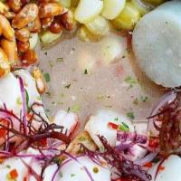 Cebiche Mixto · Grouper, shrimp, octopus, mussels, scallops, red onion, aji limo, chocolo, cancha, yellow sw...