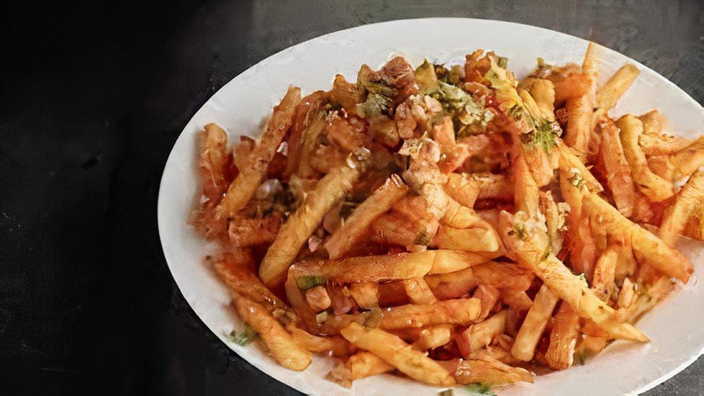 Cajun Garlic Fries · Skin-on fries tossed with fresh garlic, parsley and spices.