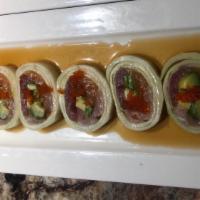 Narudo Roll · 6 pieces. Tuna, salmon, yellowtail, avocado, scallion, tobiko wrapped in cucumber, and serve...