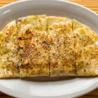 Chicken Quesadilla · Marinated grilled chicken, green pepper, onion, shredded cheese.