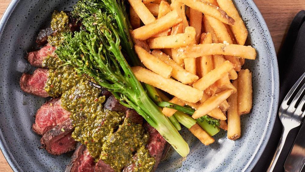 Makers Flatiron Steak & Fries  · Chimichurri, grilled broccolini, parmesan garlic butter fries.