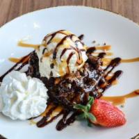 Rockslide Brownie Sundae · warm triple chocolate-caramel-pecan brownie, vanilla ice cream, chocolate & caramel sauce, w...