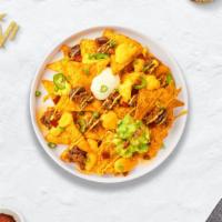 Load It Up Vegan Nachos · (Vegan) Salted tortilla chips topped with your choice of meat, guacamole, sour cream, salsa,...