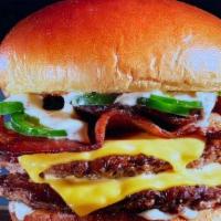 Hell'S Kitchen Burger · Made with FRESH Angus Beef, Jalapeño Ranch, Jalapeño Peppers, Jalapeño Bacon, Cheese and ser...