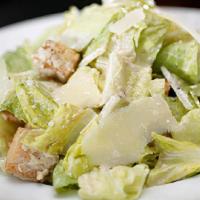 Caesar Salad · Crisp romaine, aged Parmesan cheese, garlic croutons.