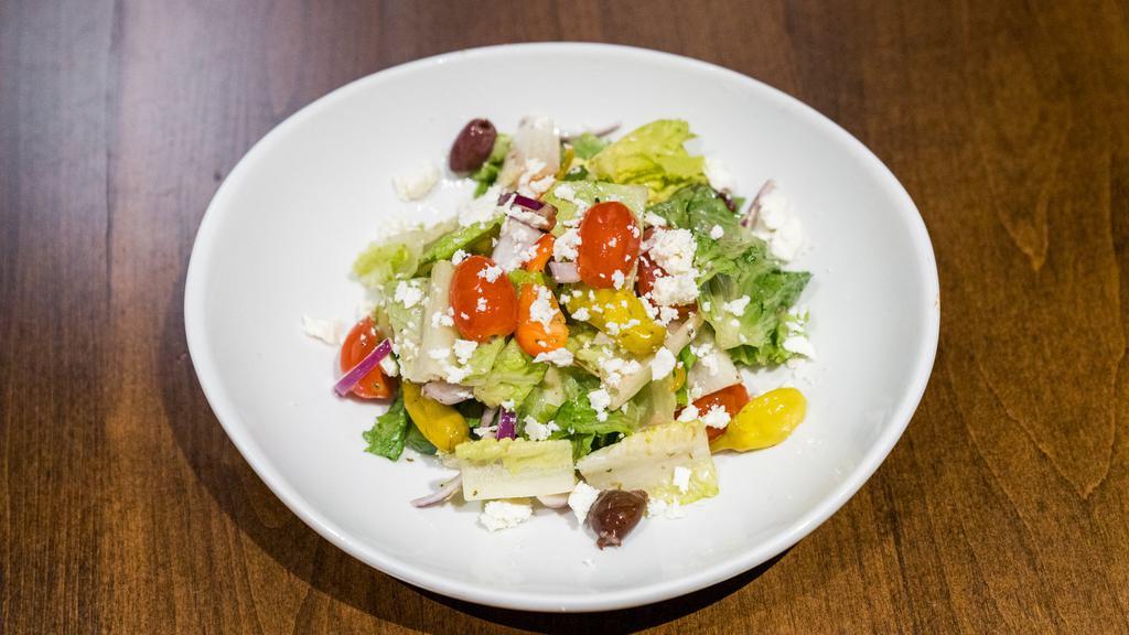 Greek Salad  · Romaine lettuce, feta cheese, cucumbers, cherry tomatoes, red onions, red peppers, green peppers, kalamata olives, pepperoni, Greek vinaigrette