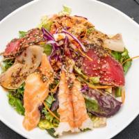 Sashimi Salad · Salmon, tuna, yellowtail shrimp, spring mix salad, cucumbers & sashimi salad sauce.