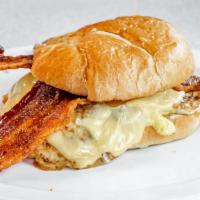 Breakfast Croissants · Simple Lil breakfast sandwich. Your choice of sausage, bacon or chicken on a toasted croissa...