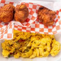 Ackee & Saltfish · Our national dish served with fried dumplings or rice.