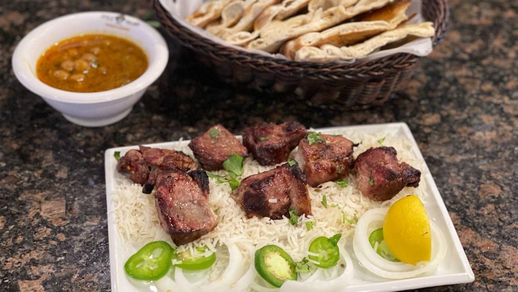 Shinwari Namkeen Lamb Tikka · Skewered pieces of lamb marinated with salt and spices. (Served with 1 Nan bread, Salad and Mint Sauce)