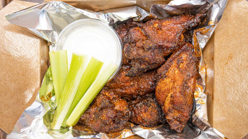 Jerk Wings · 8 Jumbo Chicken Wings, brined and marinated, smoked and fried. Topped with Jerk Seasoning. Served with celery and ranch dressing.