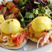 Poached Eggs And Smoked Salmon · 2 poached eggs with smoked salmon, goat cheese, red onions and capers on English muffins, se...
