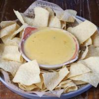 Chile Con Queso - Snacks · A blend of cheese with fire-roasted chiles & tomatoes, tortilla chips [Vegetarian]