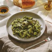 Tortellini Pesto · Tasty cheese tortellini tossed in a savory pesto sauce and topped with fresh Parmesan cheese.