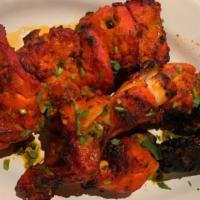 Chicken Tikka Special · Tasty mix of chicken leg and thigh pieces
lightly marinated and cooked in tandoor.( 6pcs)