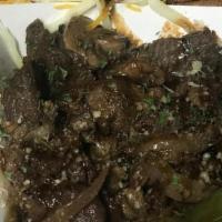 Steak Bites · Flavorz steak bites season with our blend zip sauce onions and bell peppers a bed of rice sw...