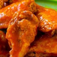 Wings · 6, 9, 12 & Boneless wings. Choice of sauce. Comes with ranch or blue cheese.