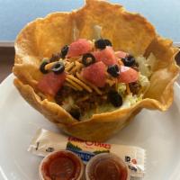 Taco Salad · Lettuce, Taco Meat, Cheese, Tomato, Black Olives. Sour cream & salsa included. Comes In An E...