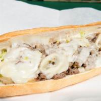 Cheese Steak · Philly steak, provolone, grilled onions, banana peppers, lettuce, tomatoes and mayo.