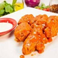Chicken Wings · BBQ, Buffalo, or Plain. Add sauce for an additional charge.