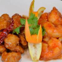 Dragon & Phoenix · Hot and spicy. A combination of general tao's chicken on one side and shrimp with hot and sp...
