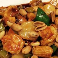 Kung Pao Delight · Hot and spicy. Fresh scallop, Gulf Shrimp and chicken sautéed with vegetable in a wine sauce