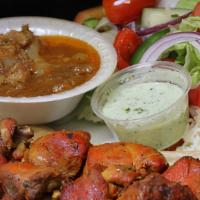A-8 Bone-In Chicken Kabob · Bone-in Chicken marinated in special herbs and spices, broiled on a skewer