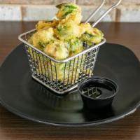 Brussels Sprout Tempura · Deep-fried brussels sprouts served with tempura sauce.
