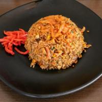 Kimchi Fried Rice · Kimchi, onion, carrots, green onion, egg, chopped pork chashu & rice.