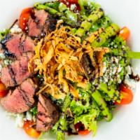 Steak Salad · Mesclun greens, bistro steak, roasted asparagus, tomato, crispy onion straws, crumbled bleu ...