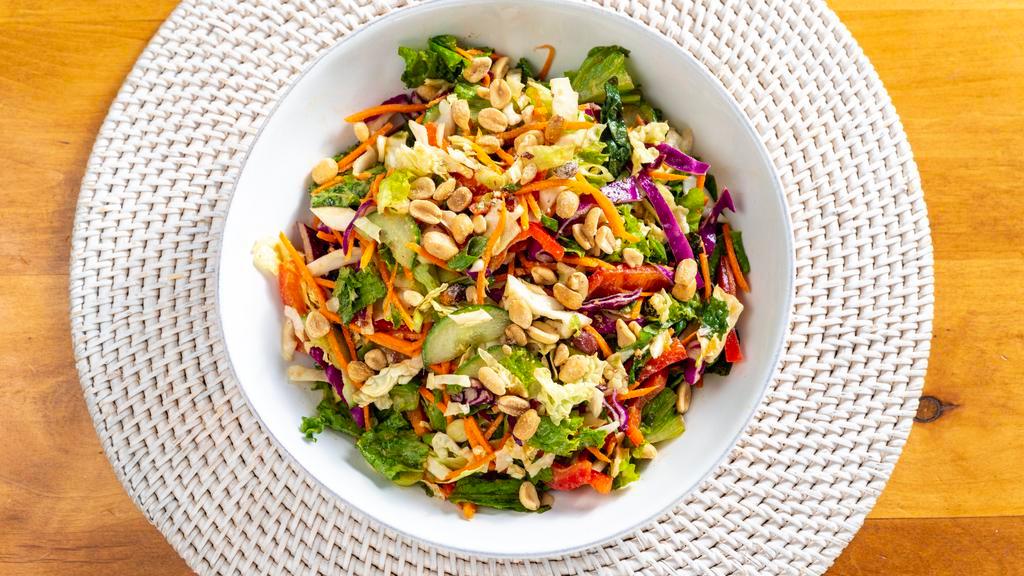 Thai Peanut & Basil Salad · Contains peanuts, tree nuts, soy. Cabbage, red leaf lettuce, carrots, bell pepper, cilantro, basil, mint, green onion, cucumber, peanuts and lime peanut vinaigrette. (dressing served on the side).