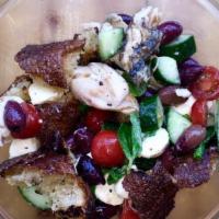 Meg'S Bread Salad · Contains wheat and dairy. Grilled sea wolf sourdough bread, roasted chicken, kalamata olives...